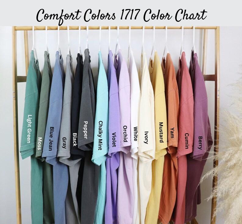 May include: A color chart of 14 different t-shirt colors from Comfort Colors 1717. The colors are: Light Green Moss, Blue Jean, Gray, Black, Pepper, Chalky Mint, Violet, Orchid, White, Ivory, Mustard, Yam, Cumin, and Berry.