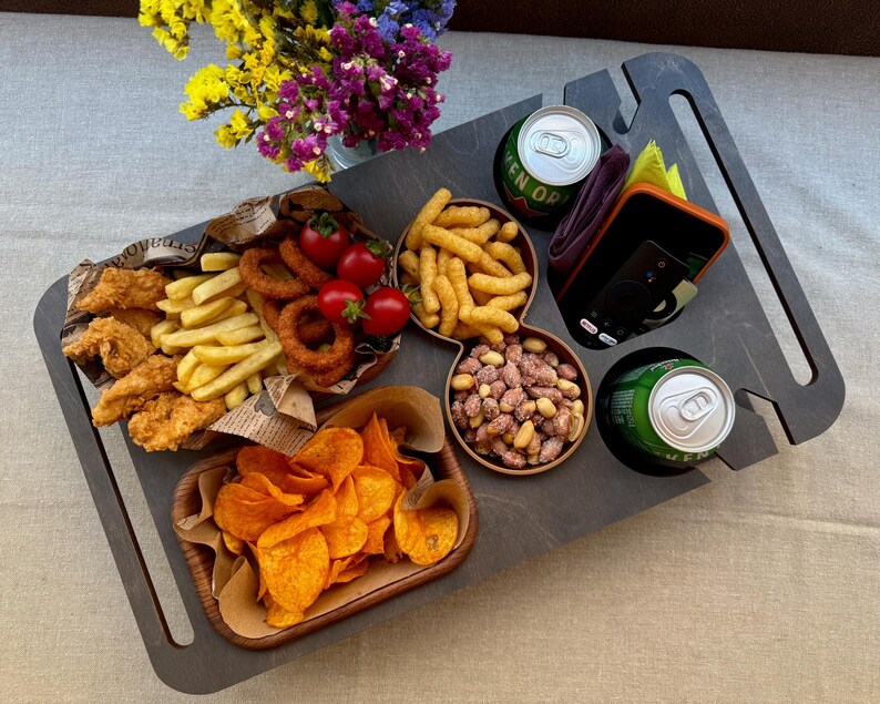 Gray Couchbar wooden serving tray full of snacks
