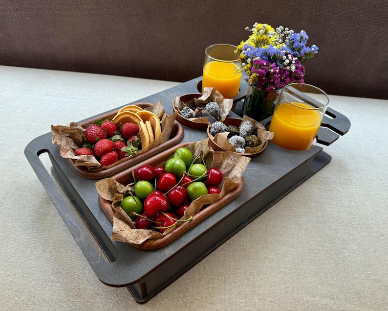 Personalized couch tray with custom name, drink holders, and holiday setup