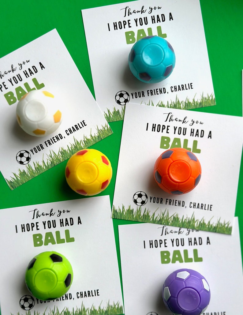 May include: Five thank you cards with a soccer ball theme. Each card has a different colored soccer ball attached to it. The cards say "Thank you I hope you had a ball" and "Your friend, Charlie".
