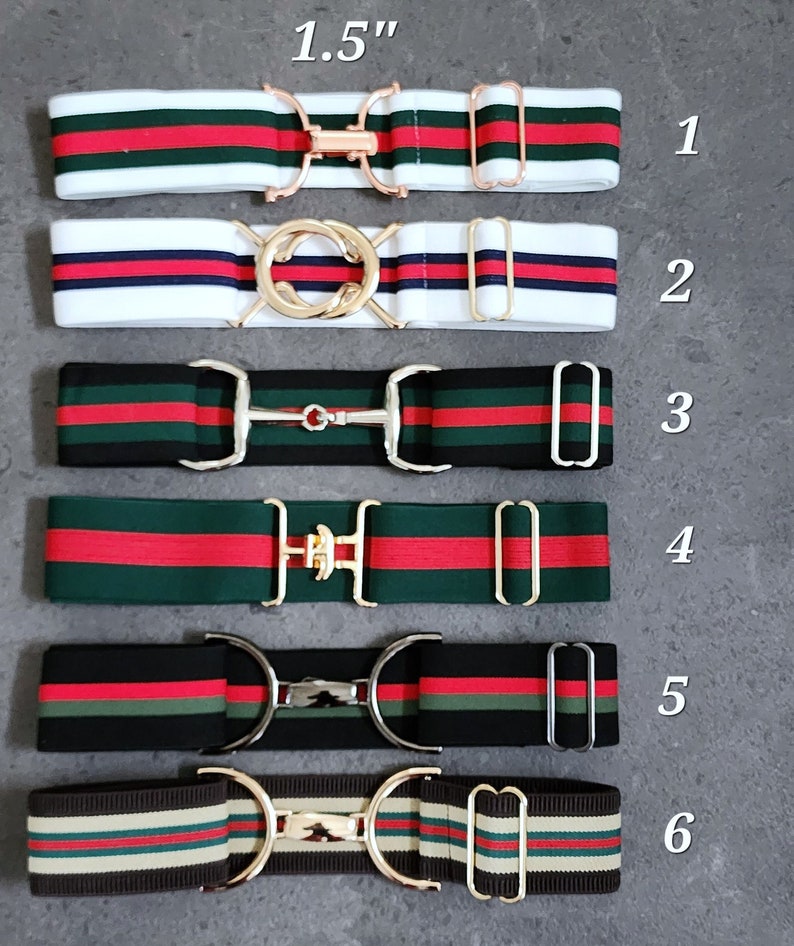 Pode incluir: Seis cintos el&aacute;sticos de 1,5 polegadas de largura com listras de cores diferentes e estilos de fivela. Os cintos s&atilde;o numerados de 1 a 6.