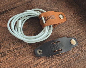 Juego de 2 portacables, sujetacables y organizadores, organizadores de cables de cuero en marrón oscuro/marrón bronceado