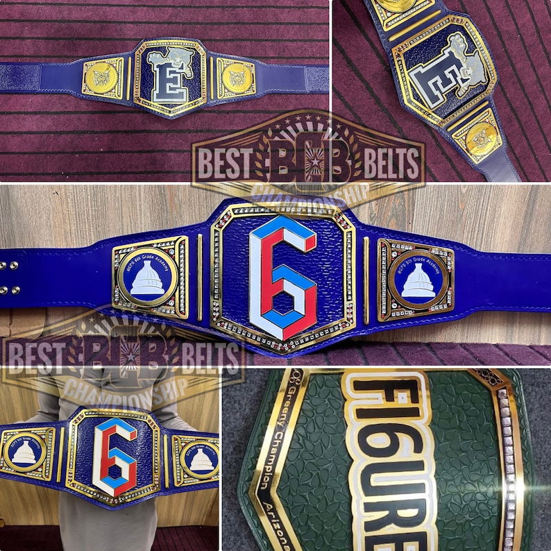 May include: A blue and gold championship belt with a large gold number "6" in the center. The belt has a blue strap with gold accents and a gold buckle with a white building design. The belt is decorated with rhinestones and has the text "BEST BELTS CHAMPIONSHIP" on the buckle.
