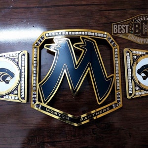 May include: Gold championship belt with black and white panther logo, the words "Morton Panthers" and the text "BEST BB BELTS CHAMPIONSHIP".