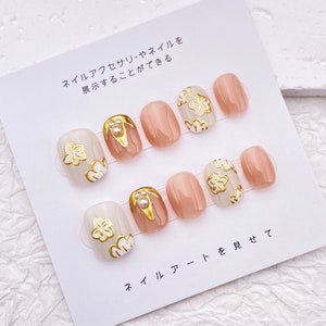 Uñas con flores de cerezo, diseños de uñas cortas y redondas, uñas postizas hechas a mano, uñas florales encantadoras, uñas primaverales bonitas, uñas sencillas y fáciles.