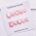 Butterfly Cat Handmade Press On Nails: Light Pink Cat Eye, Short Round product logo