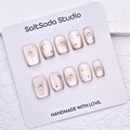 Star Moon Handmade Press On Nails: Light Champagne Pink Cat Eye, Short Square product logo