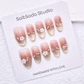 Flower Pearls Handmade Press On Nails: Light Champagne Cat Eye French Tip, Oval Shape product logo