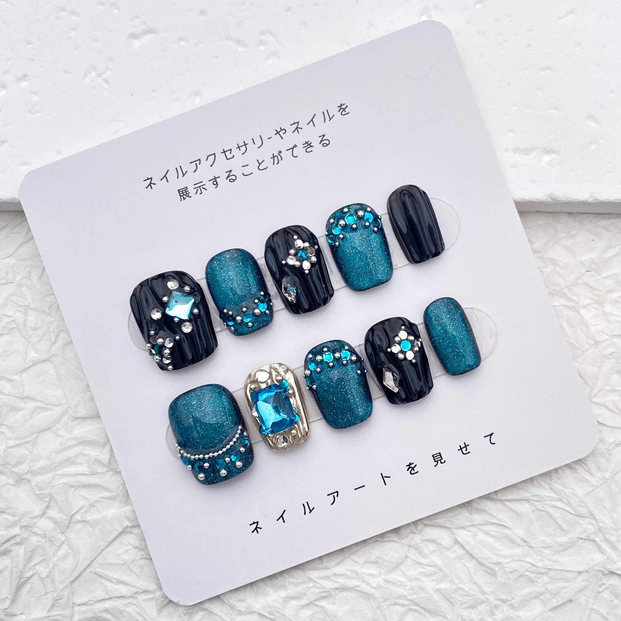 Glamorous Black Crystal Nail Trend