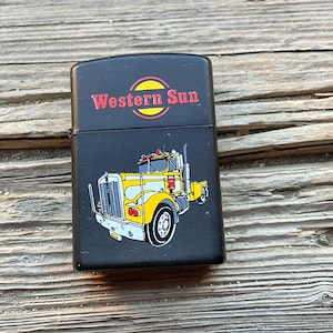 Black Champ Petrol Lighter with Truck Working condition