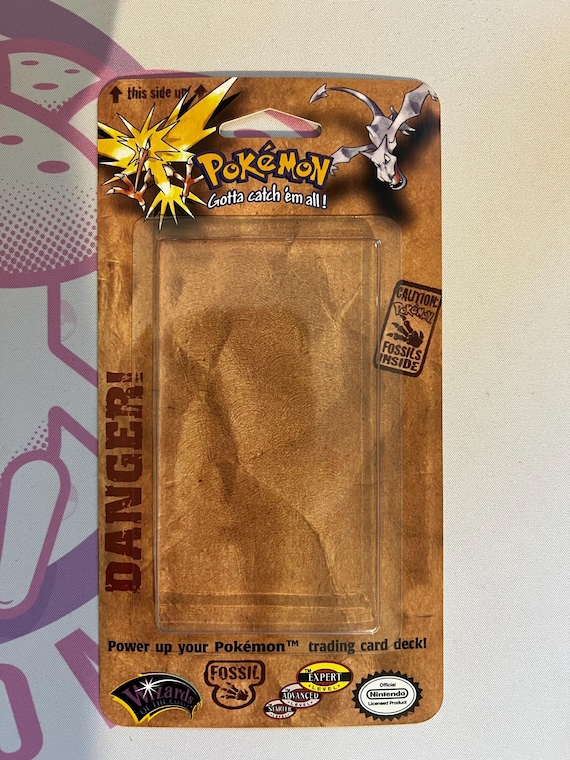 fossil pokemon cards pack Pokemon : Fossil Unlimited Booster Pack – Cards and Comics Central main image 0
