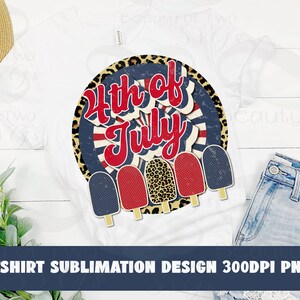 May include: A white t-shirt sublimation design featuring a red, white, and blue 4th of July graphic with a leopard print background and popsicle accents.