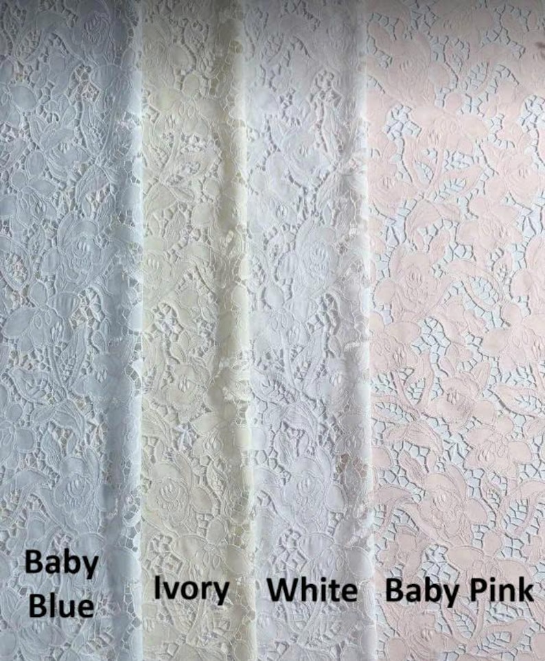 May include: Close-up of four fabric swatches in baby blue, ivory, white, and baby pink. The lace fabric features a floral pattern. The colors are labeled with text: Baby Blue, Ivory, White, and Baby Pink.