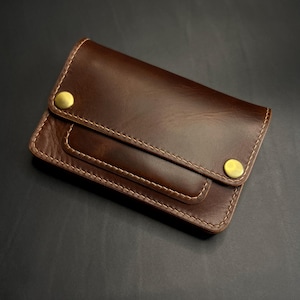 Leather mini trucker wallet with a ring for a chain or lanyard. Wallet for bikers, small wallet