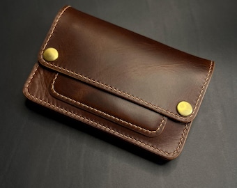 Leather mini trucker wallet with a ring for a chain or cord. Bikers wallet