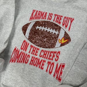 Karma is the guy on the chiefs coming straight home to me.  Crewneck (faux sequins)
