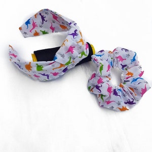 Dinosaurier Haarreif. Dinosaurier Stirnband für Mädchen. Dinosaurier Schleife. Dinosaurier Haarschmuck