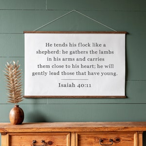 Scripture Sign | He Tends His Flock Sign | Christian Signs | Hanging Canvas | Isaiah 40:11 | Scripture Signs | Hanging Canvas Wall Art | 319