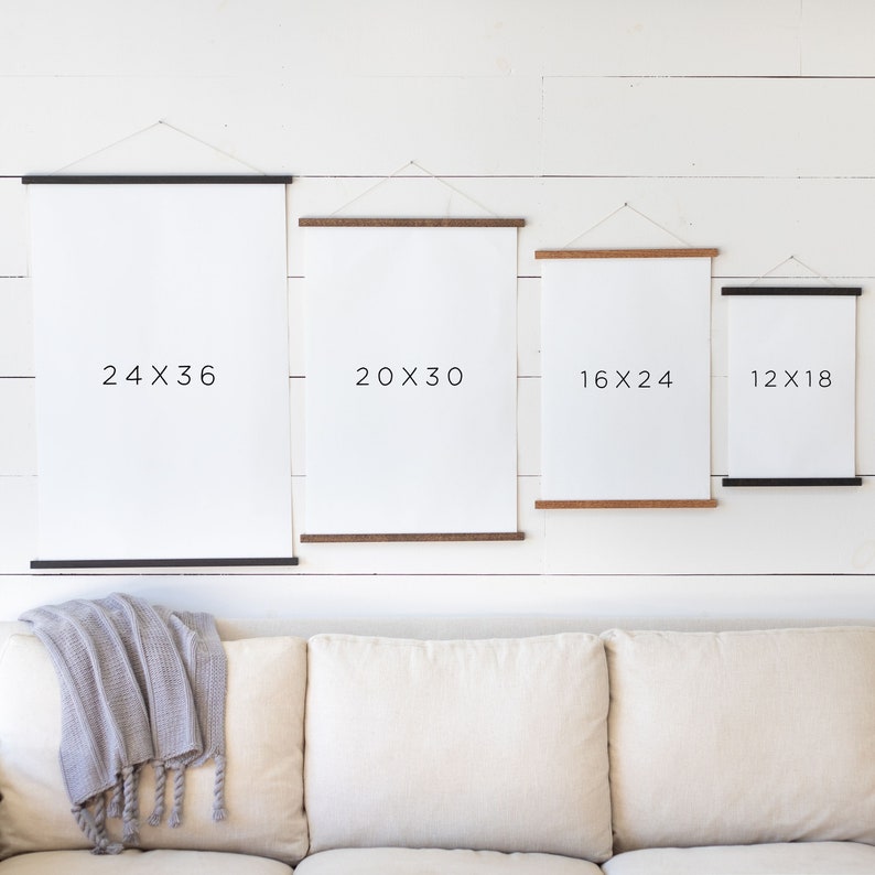 May include: Four different sizes of canvas prints with black frames, hanging on a white wall. The prints are labeled with their dimensions: 24x36, 20x30, 16x24, and 12x18.