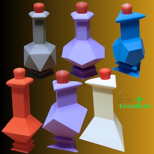 May include: Six geometrically shaped bottles in different colours, including grey, purple, blue, orange, and white. The bottles have a unique, faceted design and are arranged on a gold background.