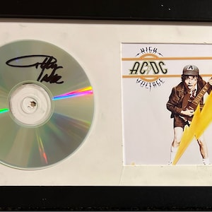 Angus Young AC/DC Signed Framed CD w Cover Photo 7x13