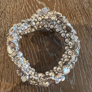 Silver floral stretch bracelet with cubic zirconia