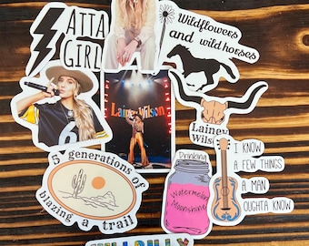 May include: A collection of colorful stickers featuring country music singer, Laine Wilson. Stickers include a portrait of Laine Wilson, a guitar, a mason jar, a cactus, a wildflower, and a horse. The text on the stickers includes "Laine Wilson", "Wildflowers and wild horses", "Drinking Watermelon Moonshine", "I know a few things a man oughta know", "5 generations of blazing a trail", and "Hillbilly Hippie".