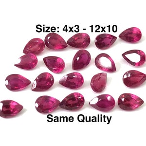 May include: Twenty pear-shaped ruby gemstones in various sizes ranging from 4x3mm to 12x10mm. The gemstones are a deep red colour and have a high polish. The text "Size: 4x3 - 12x10" and "Same Quality" are printed below the gemstones.