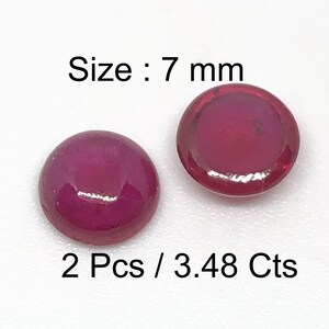 以下が含まれることがあります： 7mmの丸い赤い宝石が2つ。サイズ：7mm。2個 / 3.48カラット