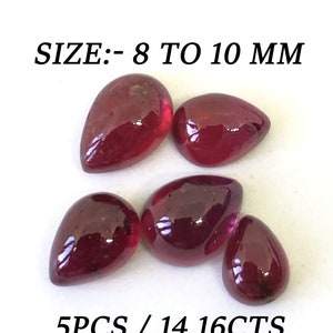 Może przedstawiać: Pięć czerwonych kropel kamieni szlachetnych, każda o wymiarach od 8 do 10 mm, o łącznej wadze 14,16 karatów.