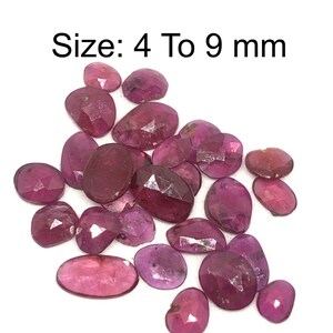 May include: A collection of 27 loose ruby gemstones, ranging in size from 4 to 9 millimeters. The stones are a deep red color and have a faceted cut. The total weight of the gemstones is 16.30 carats.  Size: 4 To 9 mm 16.30 Cts / 27 Pcs