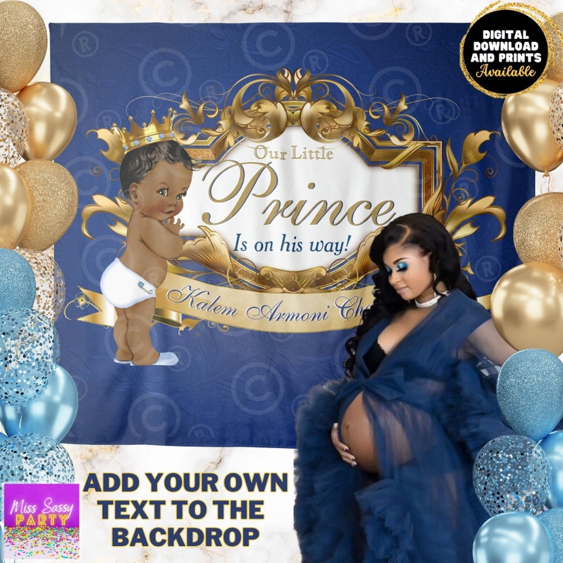 May include: A blue and gold baby shower backdrop with a crown, a baby boy illustration, and the text "Our Little Prince Is on his way!"  The backdrop is decorated with gold swirls and a gold frame.