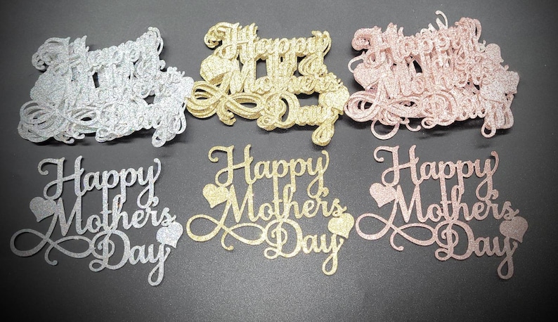 Pu&ograve; includere: Topper scintillanti "Happy Mother's Day" in argento, oro e oro rosa. Il testo in corsivo &egrave; accompagnato da cuori. Questi topper decorativi sono ideali per torte, cupcake o altri dolci festivi.