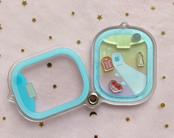 Jetset Airplane Window Seat Shaker Charm Keychain