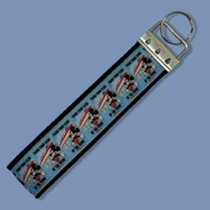 Theme Park Monorail Safety Speech, Stand Clear of the Doors Keychain Wristlet