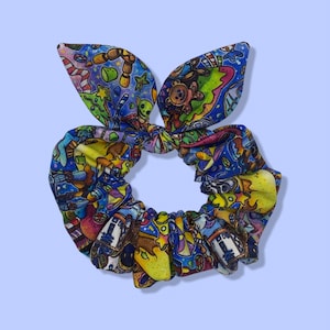 Scrunchie with Porgs as Santas, Ewoks, Wookies, Galaxy Heroes and more at Christmas Holidays Among Presents and Decorations