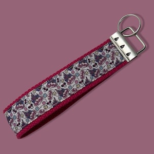Theme Park Castle Home with Theme Park Friends Keychain Wristlet