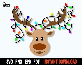 May include: A cartoon reindeer head with brown antlers wrapped in colorful Christmas lights. The reindeer has a brown nose and big brown eyes.