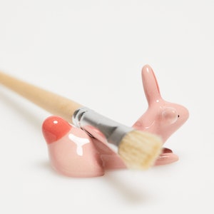 Cute ceramic bunny paint brush rest / Miniature rabbit sculpture / Handmade cute ceramics / Fox decoration / Clay art / pink brush rest image 1