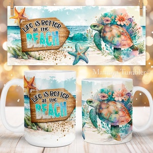 May include: White ceramic mug with a watercolor design of a sea turtle, flowers, and ocean waves. The mug has a wooden sign that reads "Life is better at the beach".