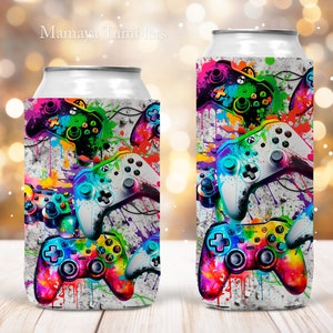 May include: Two colourful can coolers featuring a design of video game controllers and paint splatters. The design incorporates a variety of colours, including red, blue, green, yellow, and purple. The text "Mamaya Tumblers" is printed at the top of the image.