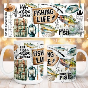 May include: Two white ceramic mugs with a fishing theme. The mugs feature a variety of fishing-related images, including fish, fishing rods, a fishing backpack, and a lantern. The text on the mugs reads "Eat. Sleep. Fish. Repeat." and "Fishing Life." and "Born to Fish."