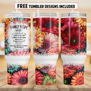 May include: White stainless steel tumbler with a floral design and the text "FAMILY RECIPE" and a list of ingredients. The tumbler has a handle and a lid.