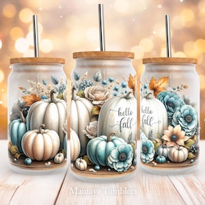 May include: Three glass tumblers with lids and straws, featuring a fall-themed design with pumpkins, flowers, and the text "hello fall".