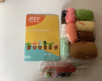 Crochet kit for beginners to make six cactus plants.