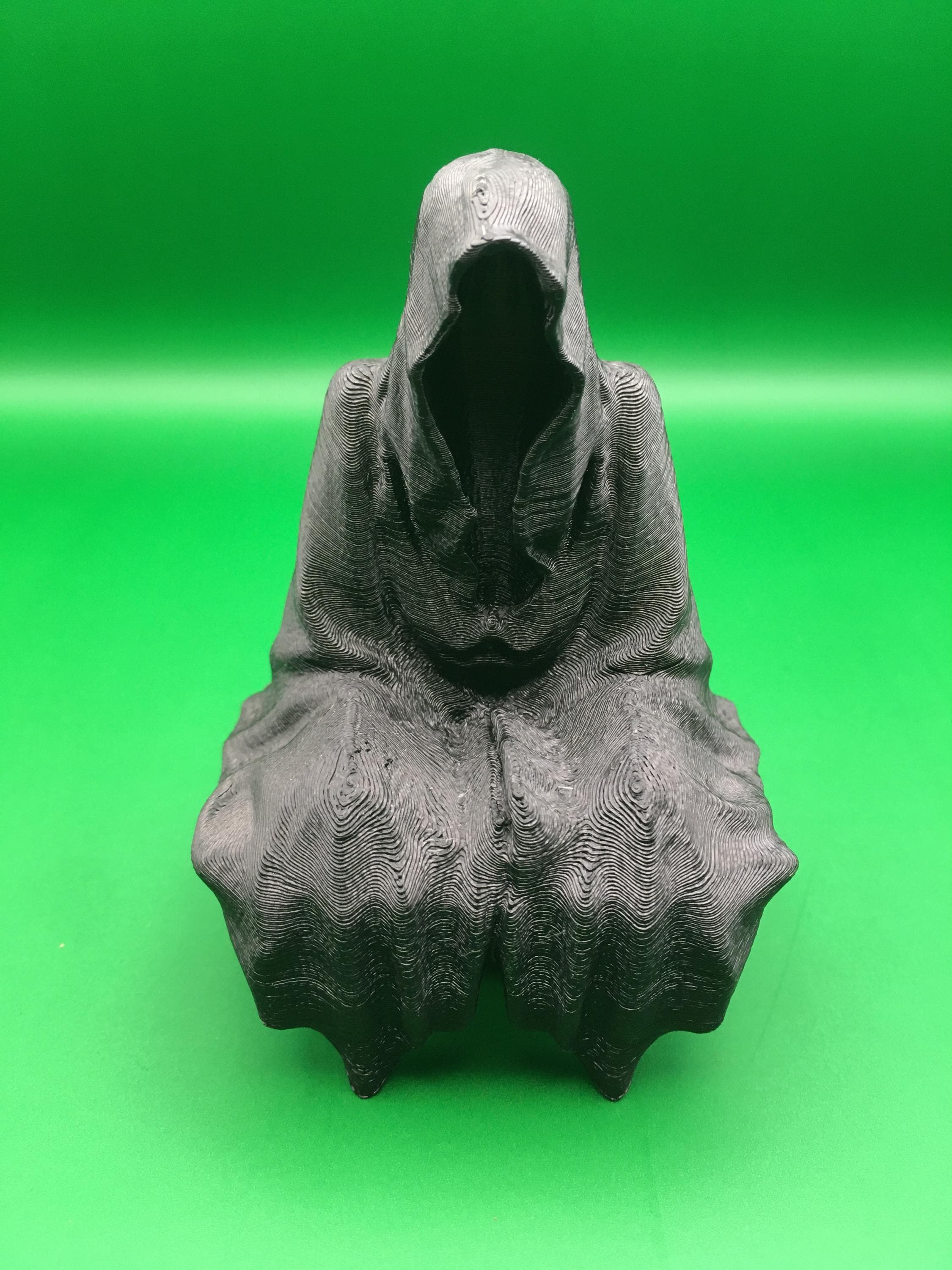 座っている人？の置物です 座っている人？の置物です