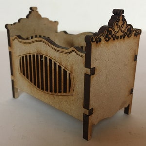 Dollhouse miniature engraved vintage baby crib cot.