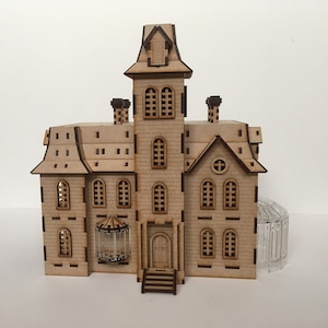 Addams Family Doll House Model Kit with open back and acrylic conservatory .Wednesday film ideal Father’s Day gift. FREE UK DELIVERY