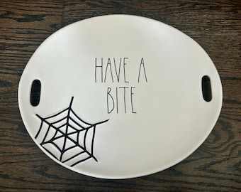 Rae Dunn Halloween Vampire Serving Tray for kitchen: "Have a Bite" white with cobwebs