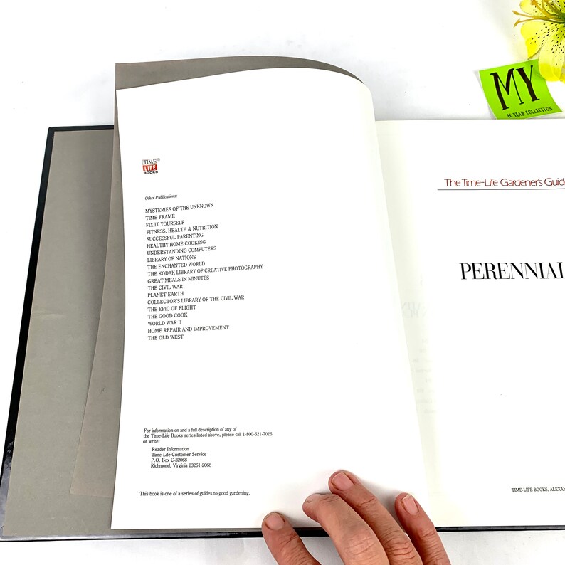 May include: An open book titled "The Time-Life Gardener's Guide: Perennial" with a white background and black text. The book is part of a series of guides to good gardening.